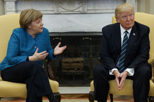 Trump/Merkel: premier contact délicat et divergences flagrantes Trump/Merkel: premier contact délicat et divergences flagrantes