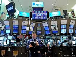 Wall Street termine en ordre dispersé, le Dow Jones décroche un nouveau record