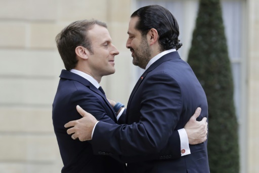 Hariri et Macron tentent à Paris de désamorcer la crise libanaise