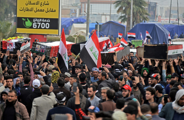 Les Chiites enterrent les morts du raid américain Les Chiites enterrent les morts du raid américain