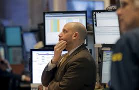 Wall Street finit en hausse après une valse-hésitation