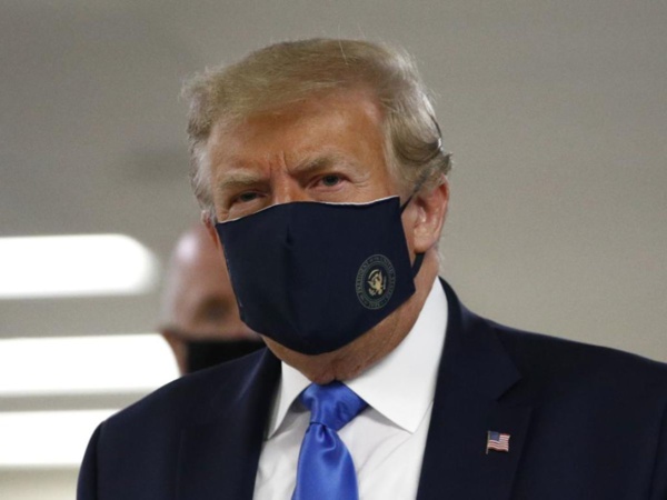 Donald Trump cède au port du masque Donald Trump cède au port du masque