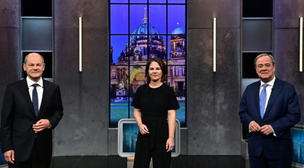 Olaf Scholz, Annalena Baerbock et Armin Laschet (de g. à d.) Olaf Scholz, Annalena Baerbock et Armin Laschet (de g. à d.)