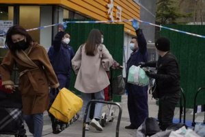 COVID-19 en Chine - Des millions de personnes confinées face à une flambée de cas record