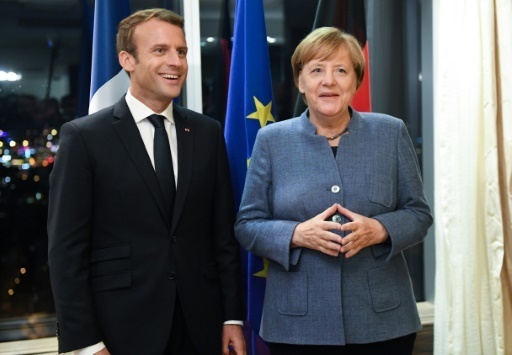 Merkel et Macron face aux "troupes" américaines à Davos
