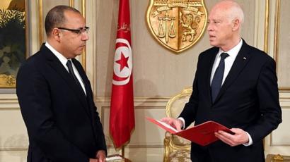 Le nouveau chef du gouvernement tunisien (g.) chez le chef de l'Etat