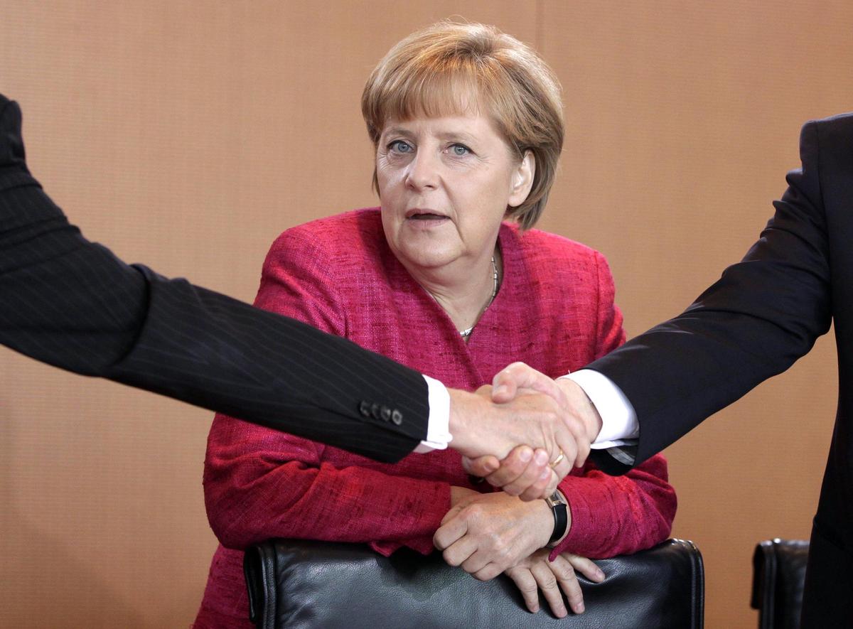 Coalition politique - En Allemagne, l’après-Merkel débute par un ménage à trois