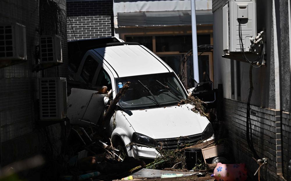 Pluies à Pékin: 44 morts, les autorités admettent des "failles"
