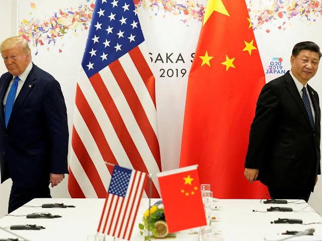 Les présidents chinois Xi Jinping (d.) et américain Donald Trump (PA)