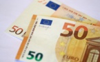 L'euro accuse le coup face au dollar après un sommet en deux ans et demi