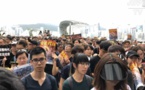 Hong Kong: les manifestants devant une gare "chinoise" pour convaincre les touristes