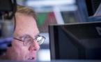 Wall Street clôt un lundi noir sur la planète Finances