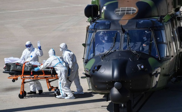 Coronavirus: 60.000 morts dans le monde, le masque s'impose peu à peu